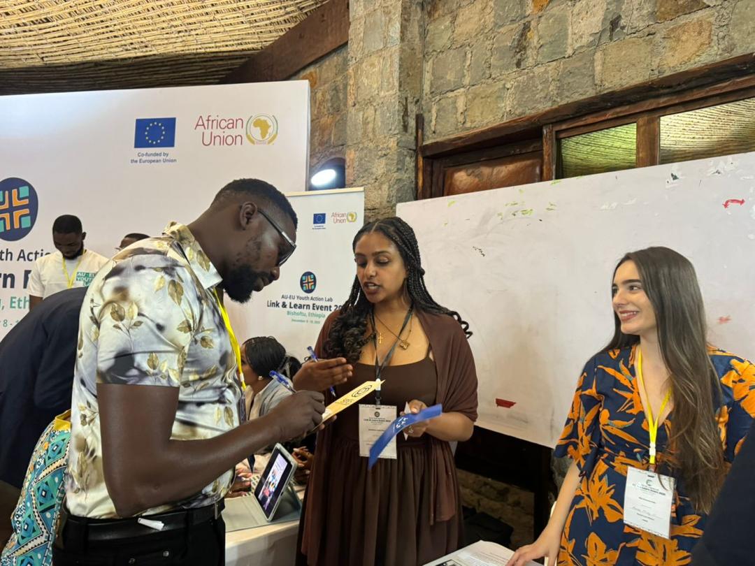 Youth leaders and researchers collaborating at a workshop